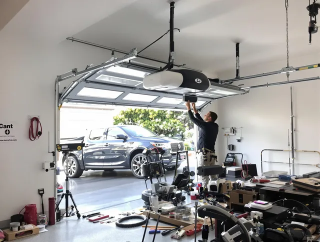 Port Wentworth Garage Door Repair specialist installing smart garage door opener system in Port Wentworth home