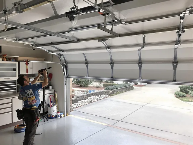 Garage door track repair service by Port Wentworth Garage Door Repair in Port Wentworth